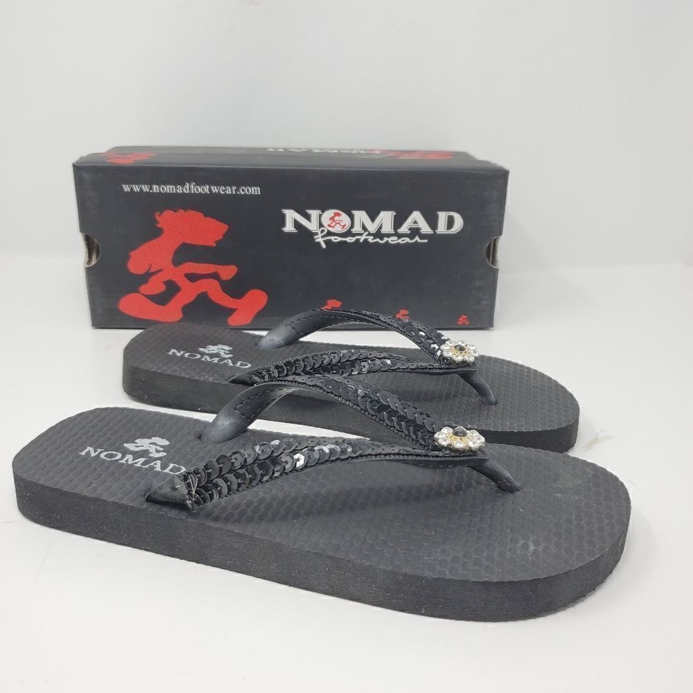Brand new nomad footwear flip flops
Black with jew